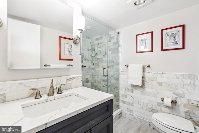 3001 Veazey Ter NW Unit 1632, Washington, DC 20008 - full bathroom with tile walls, vanity, toilet, and a shower stall
