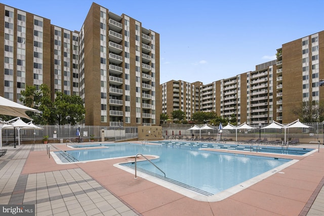 3001 Veazey Ter NW Unit 1632, Washington, DC 20008 - community pool featuring a patio area