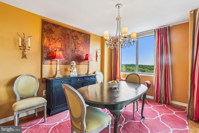 3001 Veazey Ter NW Unit 1632, Washington, DC 20008 - dining space featuring a chandelier and baseboards