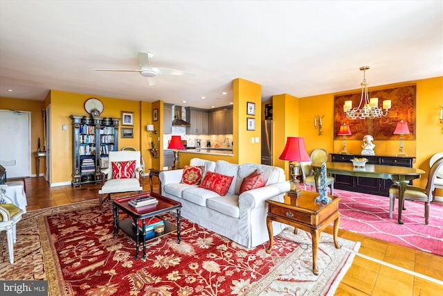 3001 Veazey Ter NW Unit 1632, Washington, DC 20008 - living room featuring a chandelier, ceiling fan, wood finished floors, and baseboards
