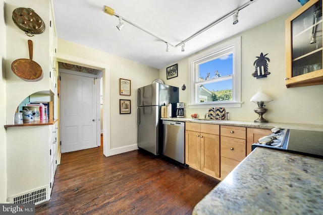 1033 Lenape Rd, West Chester, PA 19382 - kitchen with stainless steel appliances, track lighting, dark wood-type flooring, glass insert cabinets, and light brown cabinets