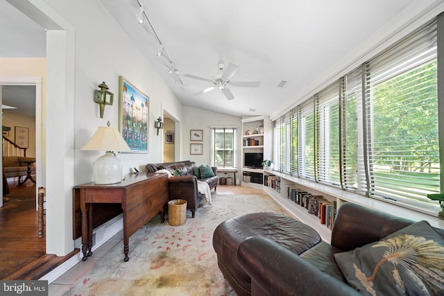 1033 Lenape Rd, West Chester, PA 19382 - living area with a ceiling fan, lofted ceiling, rail lighting, and wood finished floors