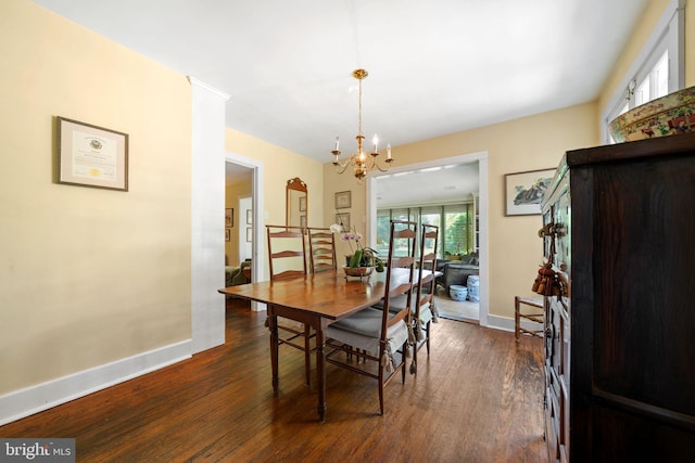 1033 Lenape Rd, West Chester, PA 19382 - dining room featuring a chandelier, dark wood-type flooring, and baseboards