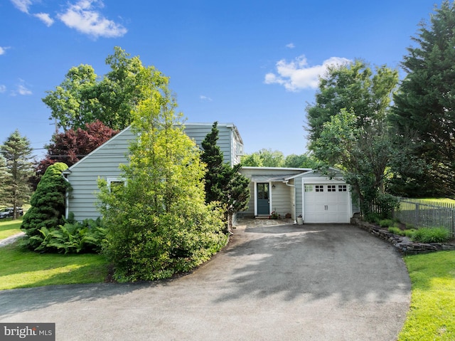 1033 Lenape Rd, West Chester, PA 19382 - view of front of house with an attached garage and asphalt driveway