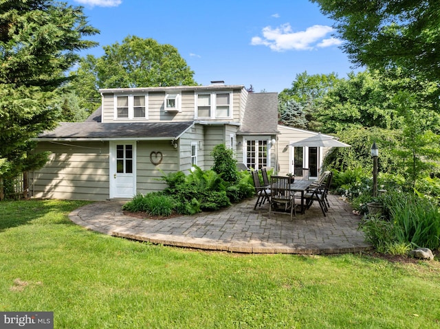 1033 Lenape Rd, West Chester, PA 19382 - rear view of property featuring a patio area, a yard, a shingled roof, and a chimney
