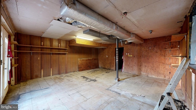 6085 Mud Mill Rd, Camden Wyoming, DE 19934 - basement with tile patterned floors and wood walls
