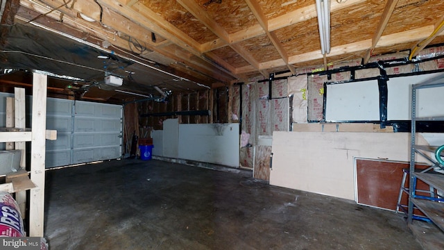 6085 Mud Mill Rd, Camden Wyoming, DE 19934 - garage featuring a garage door opener
