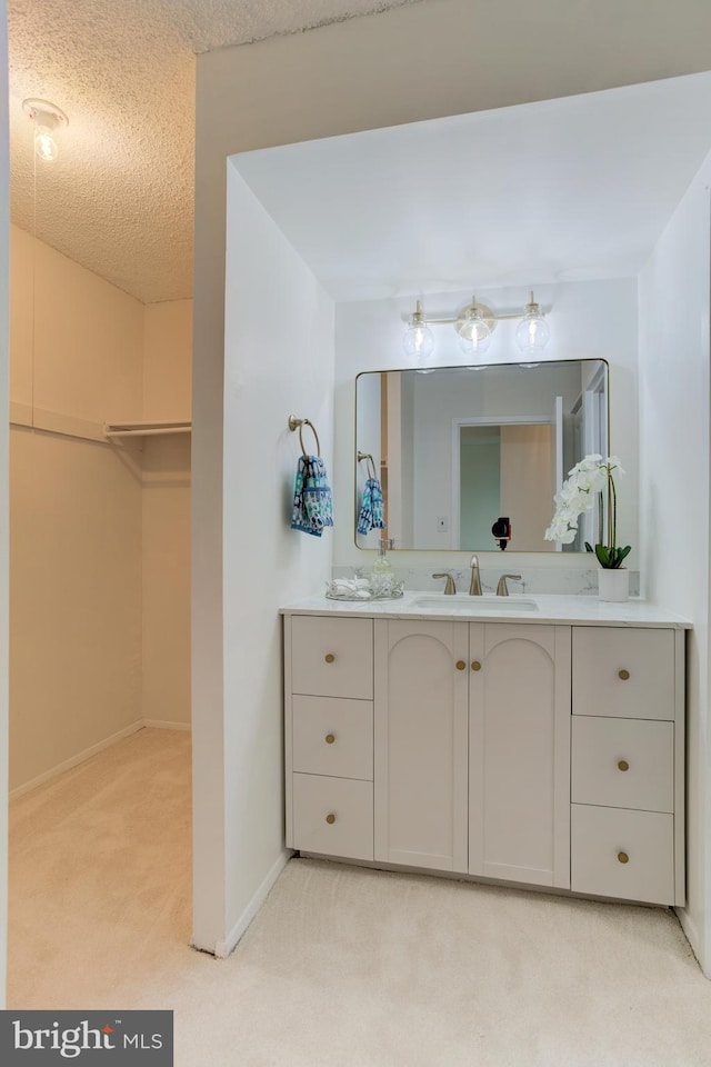 1225 Martha Custis Dr Unit 904, Alexandria, VA 22302 - bathroom with vanity, baseboards, and a textured ceiling