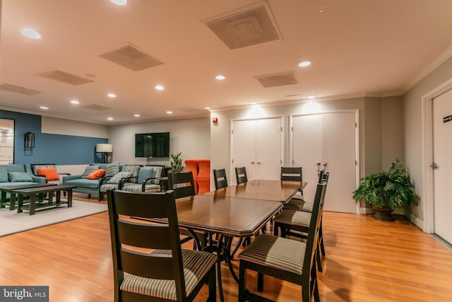 1225 Martha Custis Dr Unit 904, Alexandria, VA 22302 - dining room with ornamental molding, light wood-type flooring, and recessed lighting