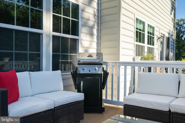 22864 Chestnut Oak Ter, Sterling, VA 20166 - wooden terrace with an outdoor living space and grilling area