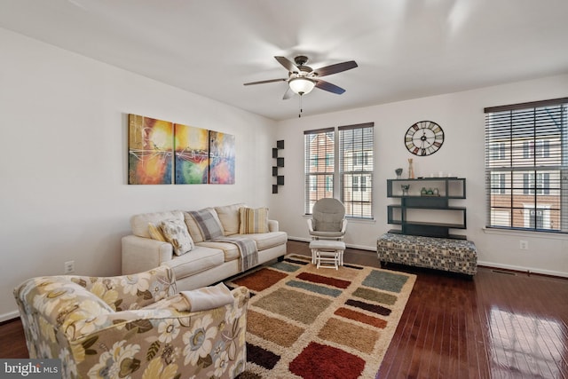 22864 Chestnut Oak Ter, Sterling, VA 20166 - living room featuring healthy amount of natural light, dark wood finished floors, ceiling fan, and baseboards