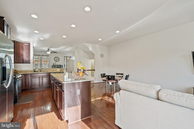 22864 Chestnut Oak Ter, Sterling, VA 20166 - kitchen with appliances with stainless steel finishes, open floor plan, dark wood-style flooring, and recessed lighting