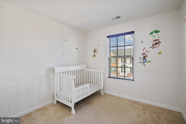 22864 Chestnut Oak Ter, Sterling, VA 20166 - carpeted bedroom featuring baseboards and a crib