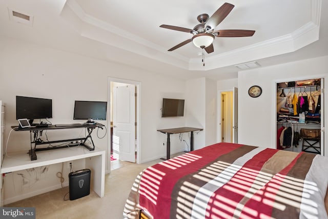 22864 Chestnut Oak Ter, Sterling, VA 20166 - carpeted bedroom with a tray ceiling, ornamental molding, a closet, a spacious closet, and an office area