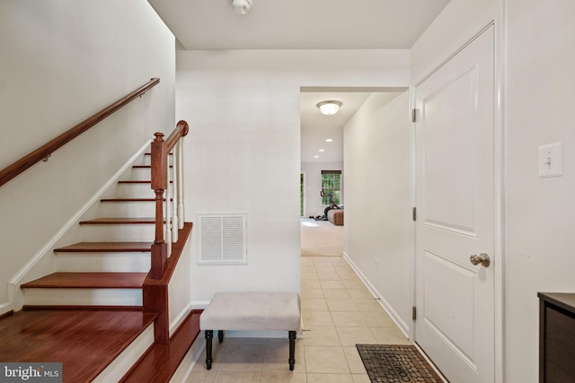 22864 Chestnut Oak Ter, Sterling, VA 20166 - stairs featuring tile patterned flooring and baseboards