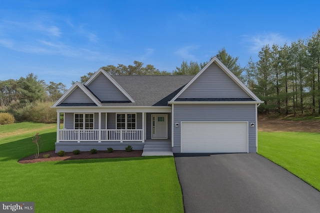 39 Mdg, Berkeley Springs, WV 25411 - view of front of house featuring a porch, a garage, asphalt driveway, and a front lawn