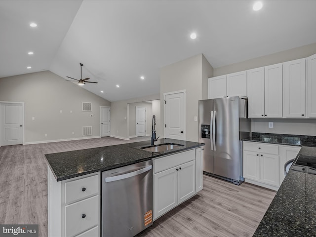 39 Mdg, Berkeley Springs, WV 25411 - kitchen featuring stainless steel appliances, a sink, a ceiling fan, white cabinetry, and vaulted ceiling
