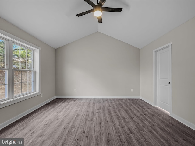 39 Mdg, Berkeley Springs, WV 25411 - spare room featuring a ceiling fan, wood finished floors, baseboards, and lofted ceiling