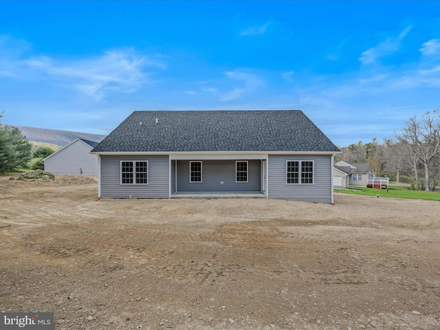 39 Mdg, Berkeley Springs, WV 25411 - back of property featuring a shingled roof