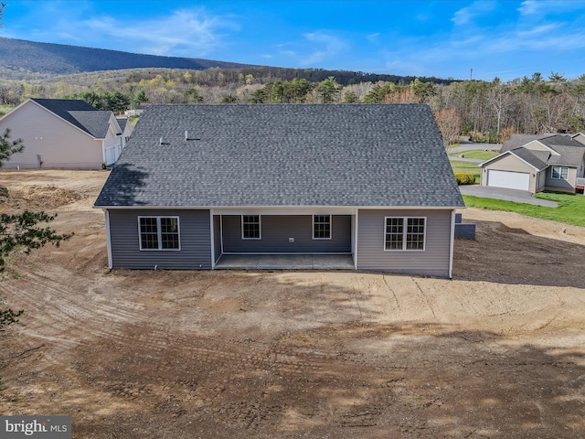 39 Mdg, Berkeley Springs, WV 25411 - rear view of house featuring roof with shingles