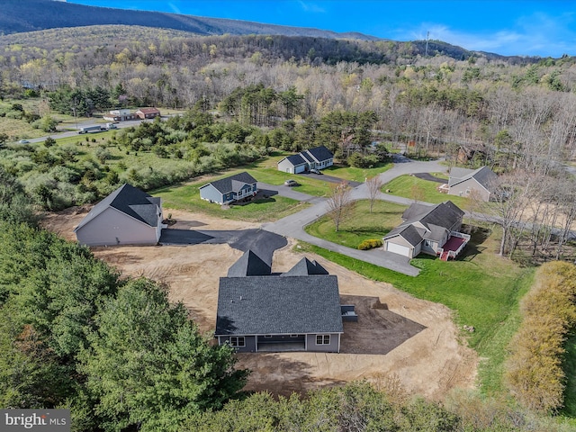 39 Mdg, Berkeley Springs, WV 25411 - bird's eye view of a heavily wooded area and a mountain backdrop