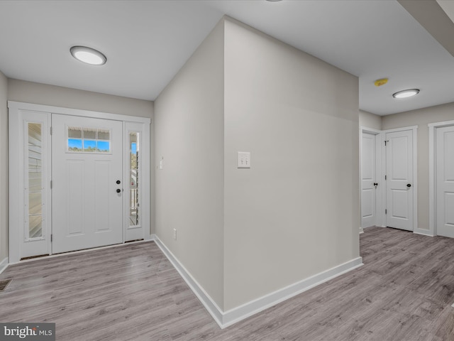 39 Mdg, Berkeley Springs, WV 25411 - foyer featuring baseboards and light wood finished floors