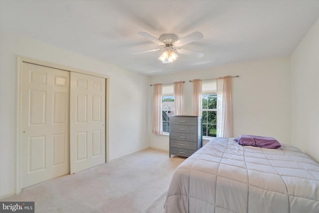1215 Oakwood Ln, York, PA 17403 - bedroom with light carpet, a closet, and ceiling fan