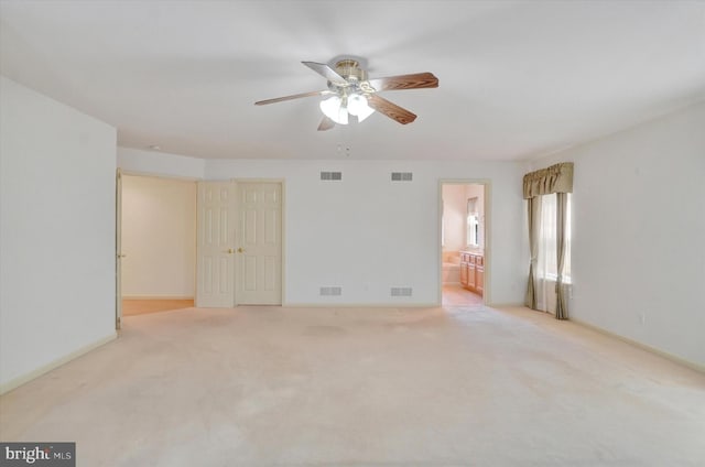 1215 Oakwood Ln, York, PA 17403 - unfurnished room with ceiling fan, light colored carpet, and baseboards