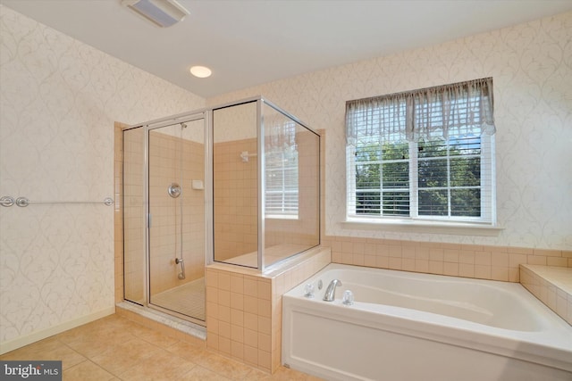 1215 Oakwood Ln, York, PA 17403 - bathroom featuring wallpapered walls, a bath, tile patterned flooring, and a shower stall