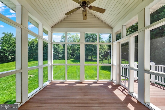 1215 Oakwood Ln, York, PA 17403 - unfurnished sunroom featuring a ceiling fan, lofted ceiling, and view of scattered trees