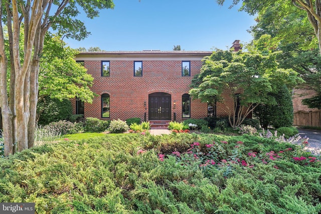 3233 Ellicott St NW, Washington, DC 20008 - colonial house with a chimney and brick siding