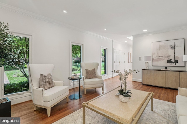 3233 Ellicott St NW, Washington, DC 20008 - living room with ornamental molding, wood finished floors, recessed lighting, and baseboards