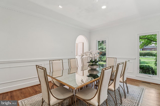 3233 Ellicott St NW, Washington, DC 20008 - dining space with ornamental molding, plenty of natural light, wood finished floors, a wainscoted wall, and recessed lighting