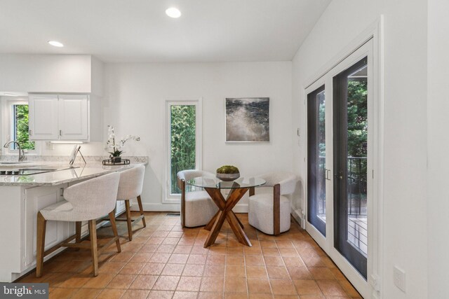 3233 Ellicott St NW, Washington, DC 20008 - dining area with recessed lighting and baseboards