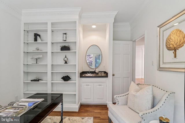3233 Ellicott St NW, Washington, DC 20008 - sitting room featuring wood finished floors, ornamental molding, and built in features