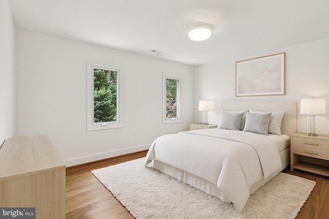 3233 Ellicott St NW, Washington, DC 20008 - bedroom with wood finished floors and baseboards