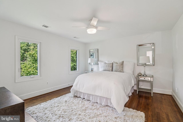 3233 Ellicott St NW, Washington, DC 20008 - bedroom featuring wood finished floors, baseboards, and a ceiling fan