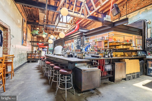 3233 Ellicott St NW, Washington, DC 20008 - bar area with concrete floors, a high ceiling, and a workshop area