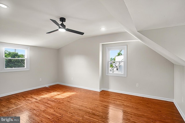 3316 Fairview Rd, Baltimore, MD 21207 - additional living space with vaulted ceiling, plenty of natural light, a ceiling fan, wood finished floors, and baseboards