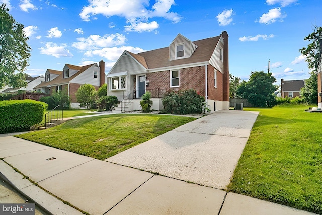 3316 Fairview Rd, Baltimore, MD 21207 - view of front of house featuring brick siding, driveway, and a front yard