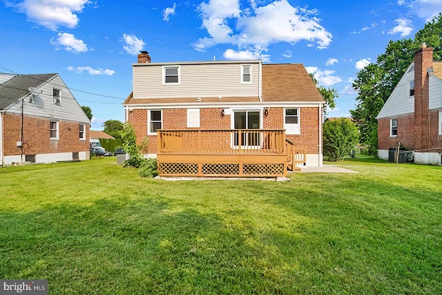 3316 Fairview Rd, Baltimore, MD 21207 - rear view of property featuring brick siding, a lawn, a wooden deck, and cooling unit