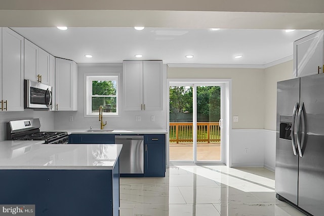 3316 Fairview Rd, Baltimore, MD 21207 - kitchen featuring appliances with stainless steel finishes, a sink, plenty of natural light, recessed lighting, and light marble finish flooring