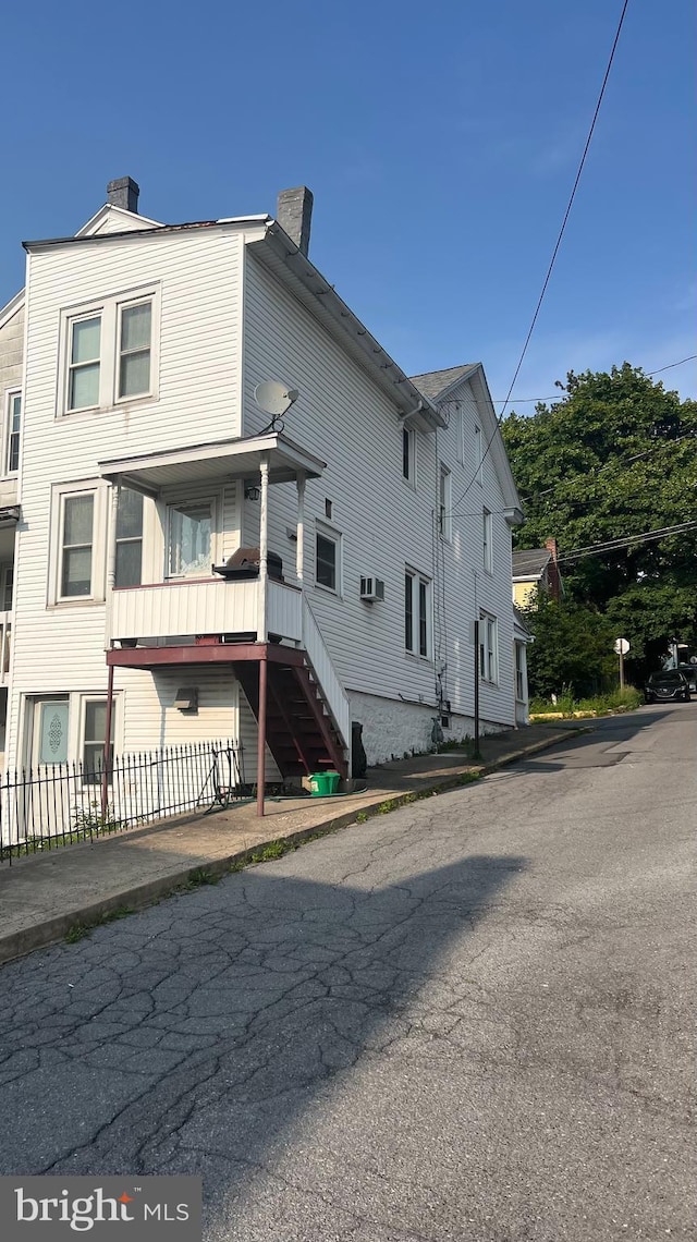 24 S 7th St, Shamokin, PA 17872 - back of property with a chimney and stairway
