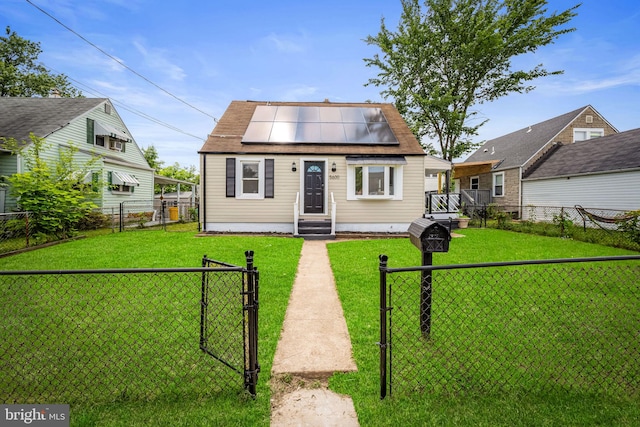 5600 Patrick Henry, Baltimore, MD 21225 - view of front of home featuring a gate and roof mounted solar panels