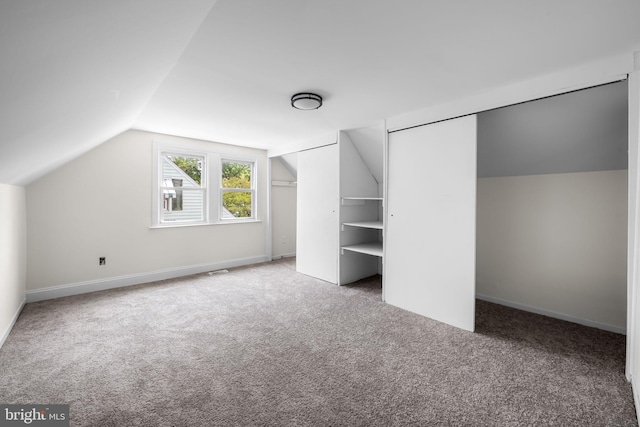 5600 Patrick Henry, Baltimore, MD 21225 - unfurnished bedroom with carpet flooring, lofted ceiling, and baseboards