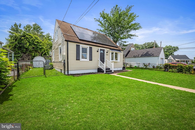 5600 Patrick Henry, Baltimore, MD 21225 - view of front facade with a gate, entry steps, and roof mounted solar panels