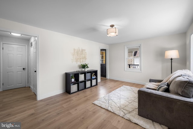 5600 Patrick Henry, Baltimore, MD 21225 - living area featuring light wood-style floors and baseboards
