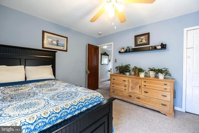 218 New Jersey Ave, Collingswood, NJ 08108 - bedroom with light colored carpet, ceiling fan, and baseboards