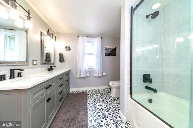 218 New Jersey Ave, Collingswood, NJ 08108 - bathroom featuring baseboards, double vanity, toilet, shower / bathtub combination, and tile patterned flooring