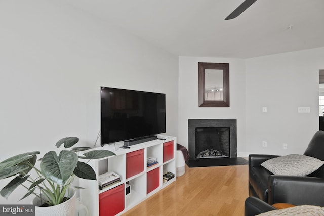 22946 Spicebush Dr Unit 1382, Clarksburg, MD 20871 - living room with ceiling fan, a fireplace with flush hearth, and wood finished floors
